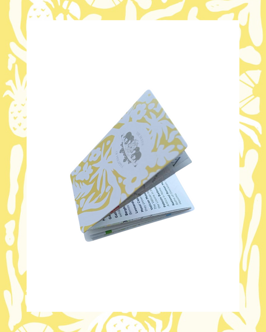 Partially open bespoke map with a floral yellow-and-white cover, featuring The House of Pineapple branding.